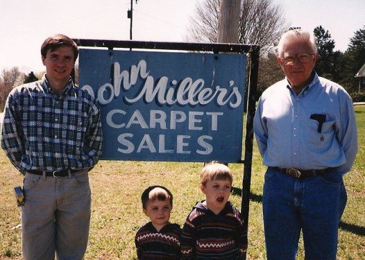 Mitch, Jonathan, Jordan and John Miller standing in front of the family's first location in Englewood, Tennessee